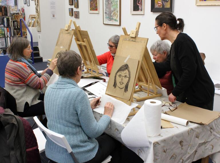 Ladies enjoying a drawing workshop