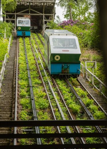 Carriages travelling on a steep funicular railway.