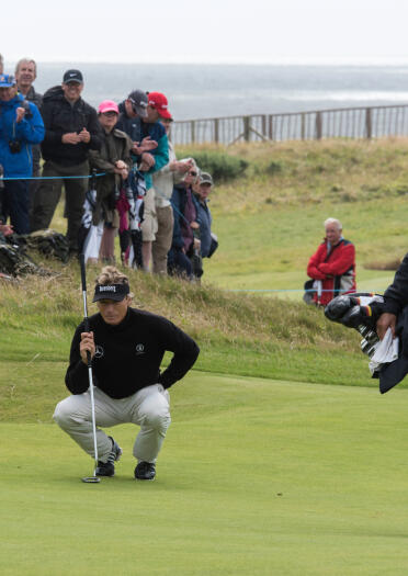 Bernhard Langher lining up a shot at the Senior Open Golf Championships, Royal Porthcawl Golf Club.